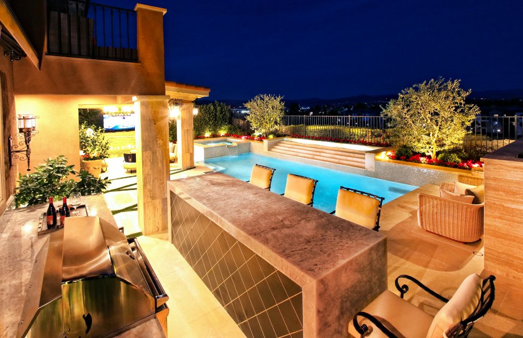 Outdoor kitchen pool bar at night, Beverly Hills