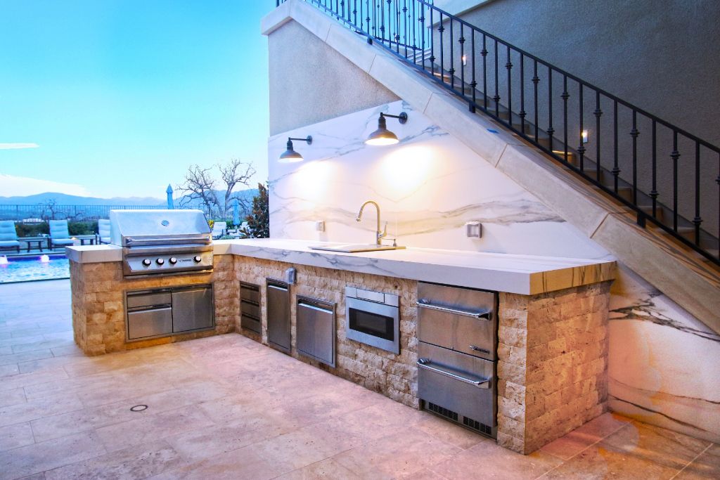Calacatta marble outdoor kitchen under stairs, Calabasas